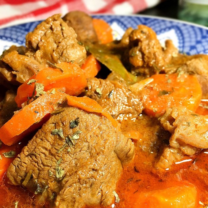 frencg beef and carrot stew in a bowl