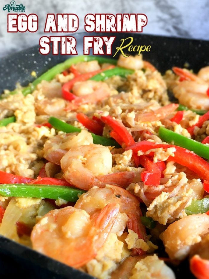scrambled egg shrimp stir fry on a pan