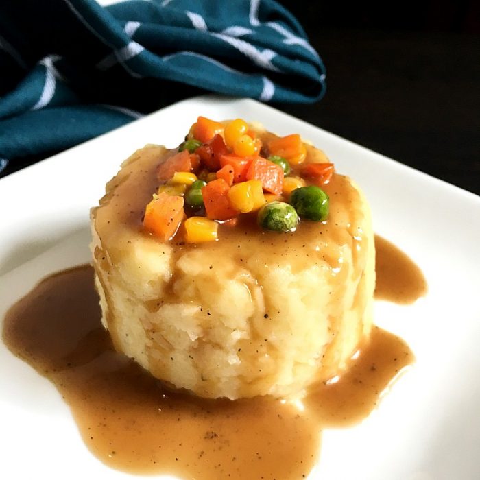 mashed potatoes topped with veggies
