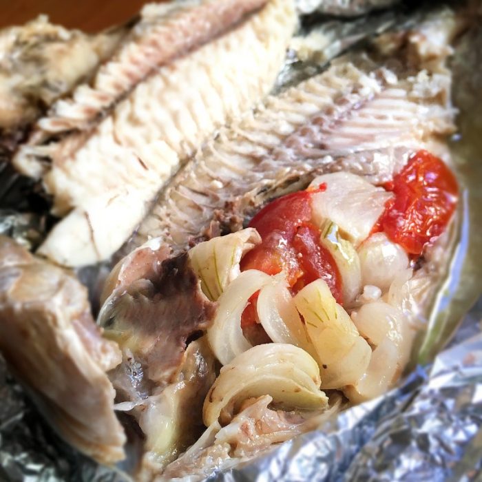 steamed fish with onion tomato stuffing