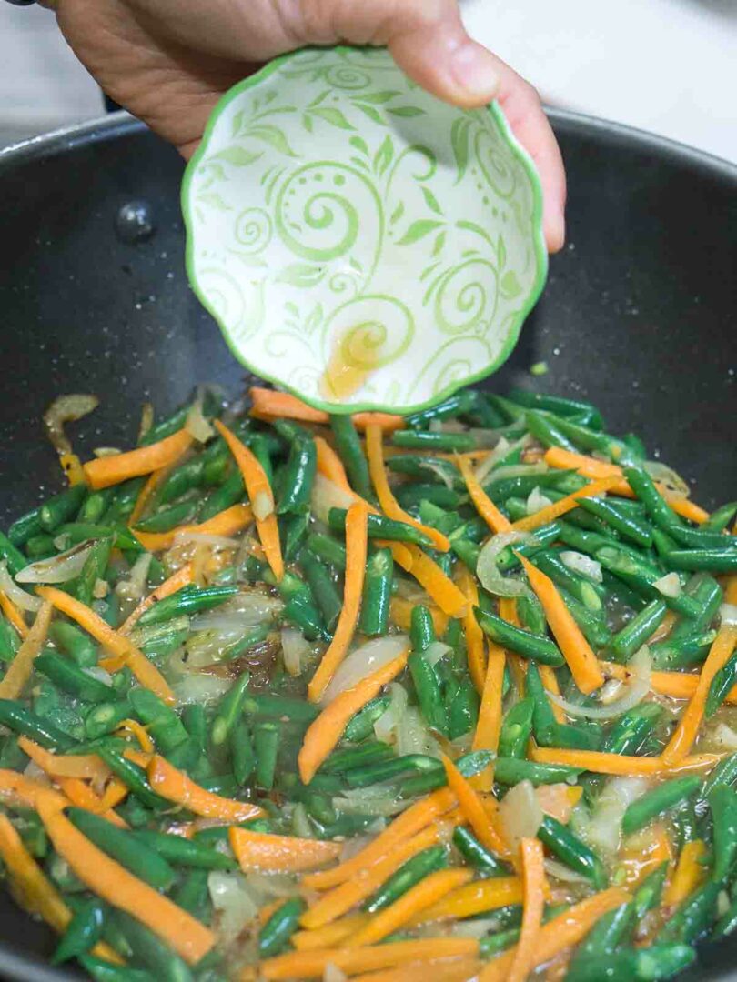 vegetables and seasoning in pan