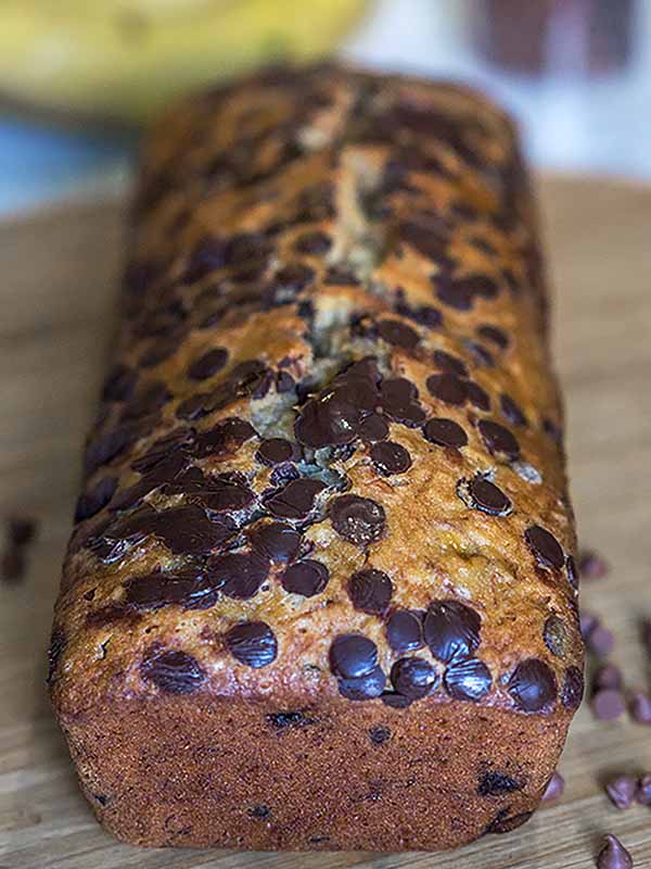 bread with chocolate chips on top of table