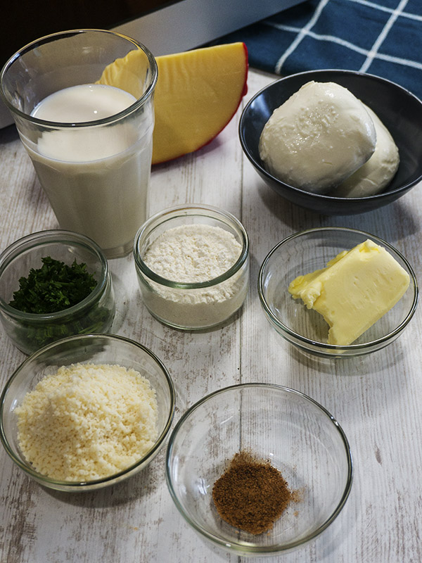 bechamel and topping ingredients on top of table