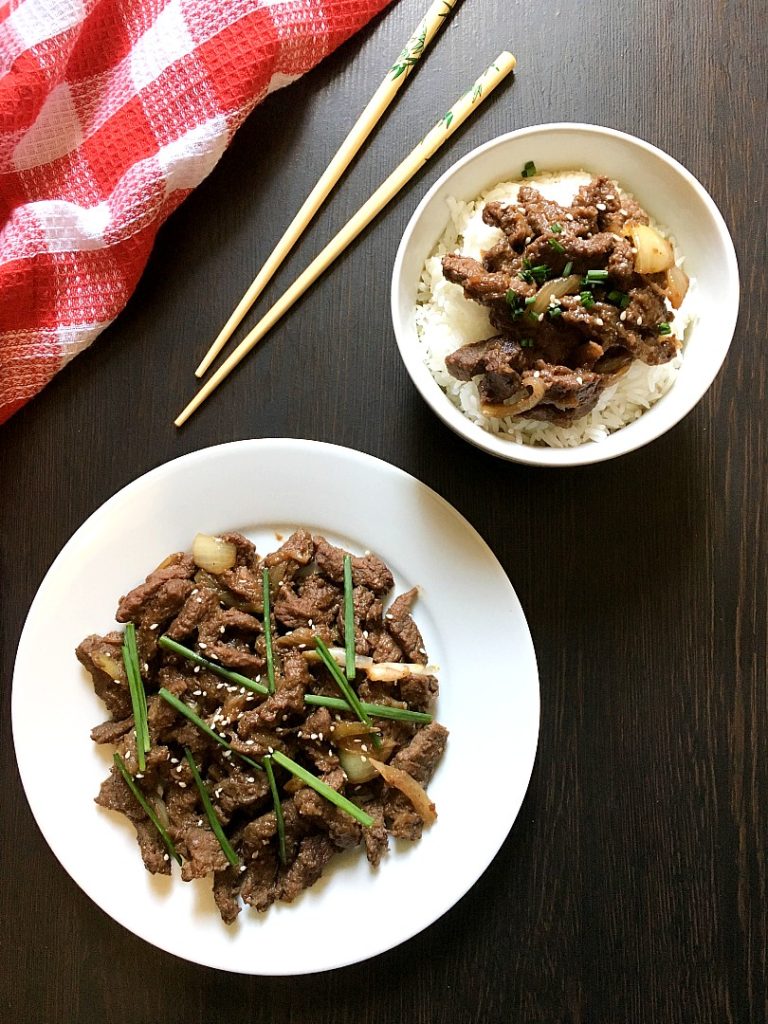 beef bulgogi served on a bowl with rice