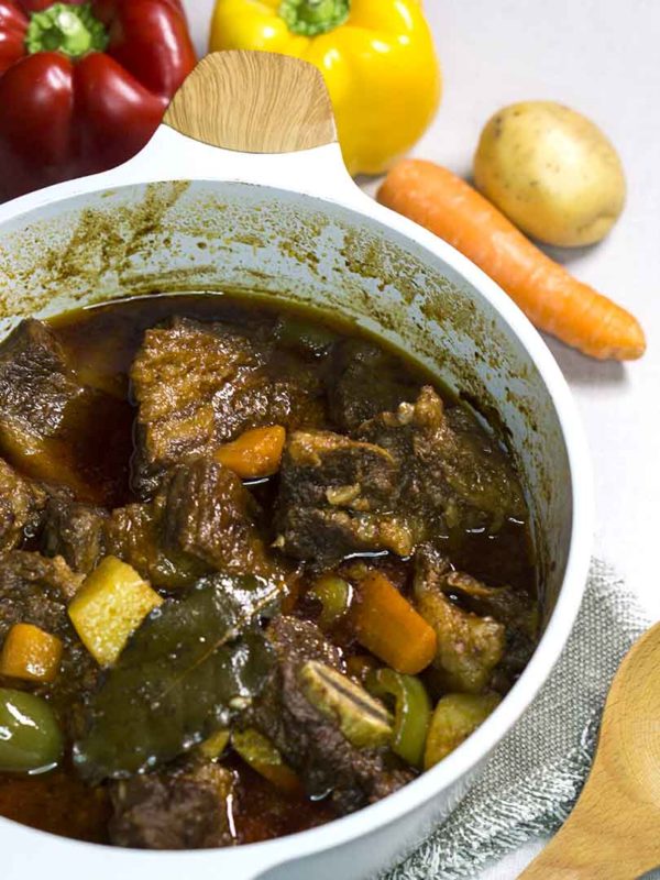 beef stew in a pot on top of table