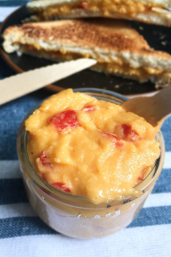 cheese pimiento with knife
