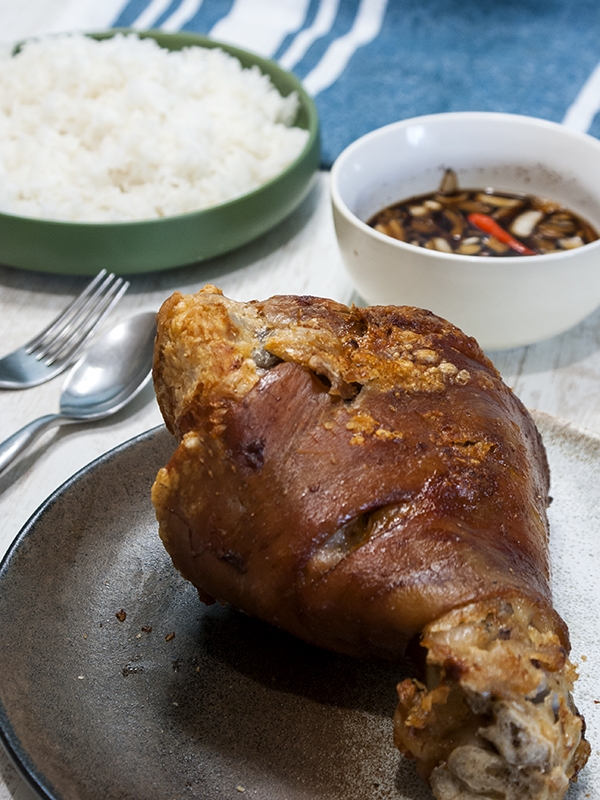 baked pork in a plate with rice
