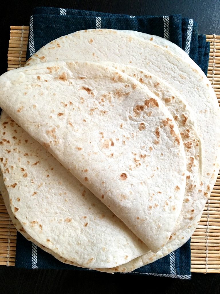 flour tortillas on top of table