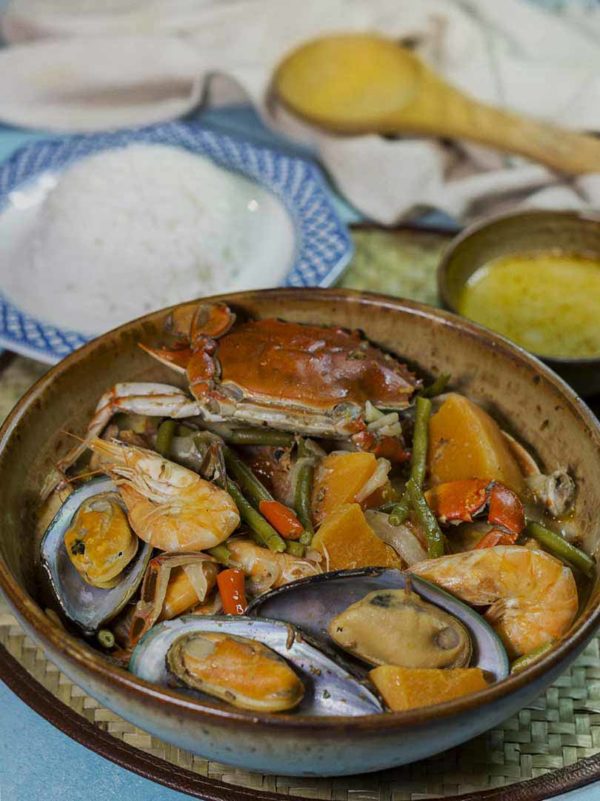 shellfish with vegetables in coconut milk in a bowl