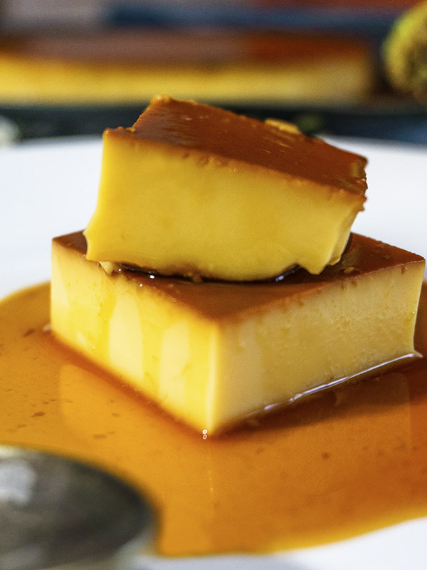 slice of creme caramel served in a plate