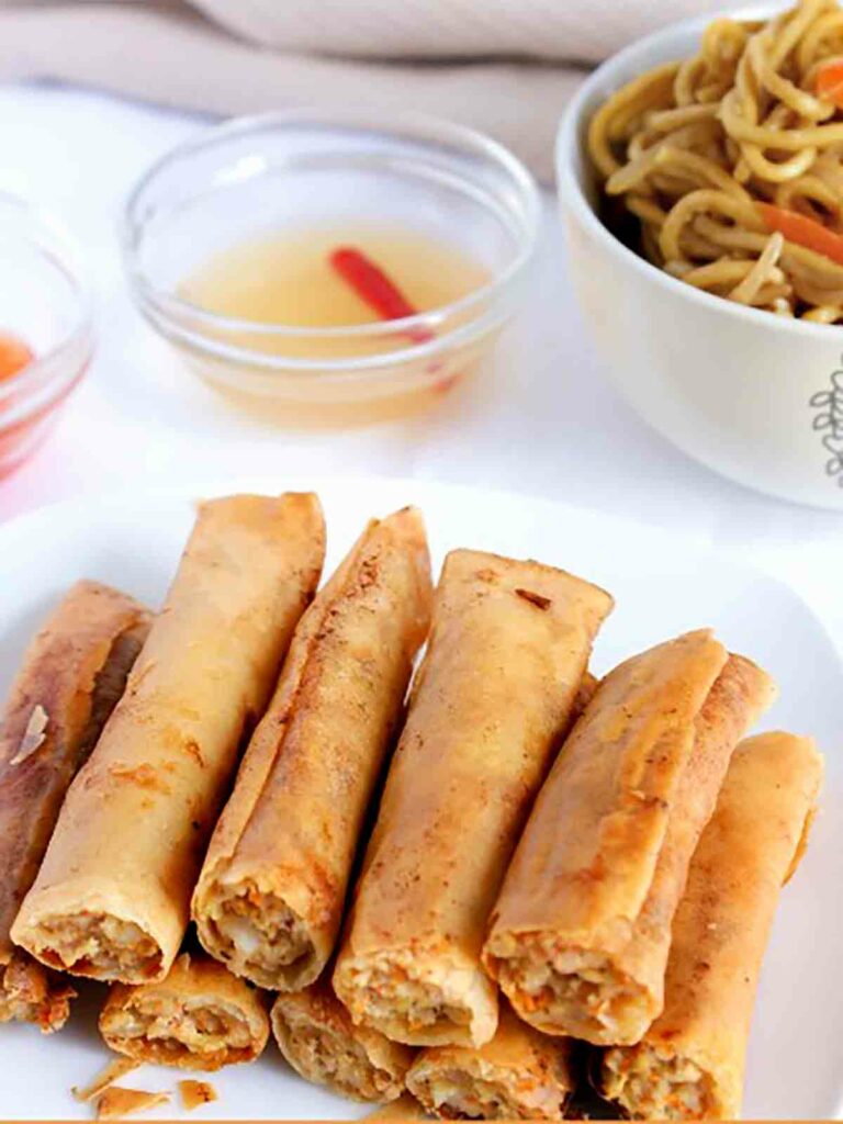 egg rolls in a plate with noodles 