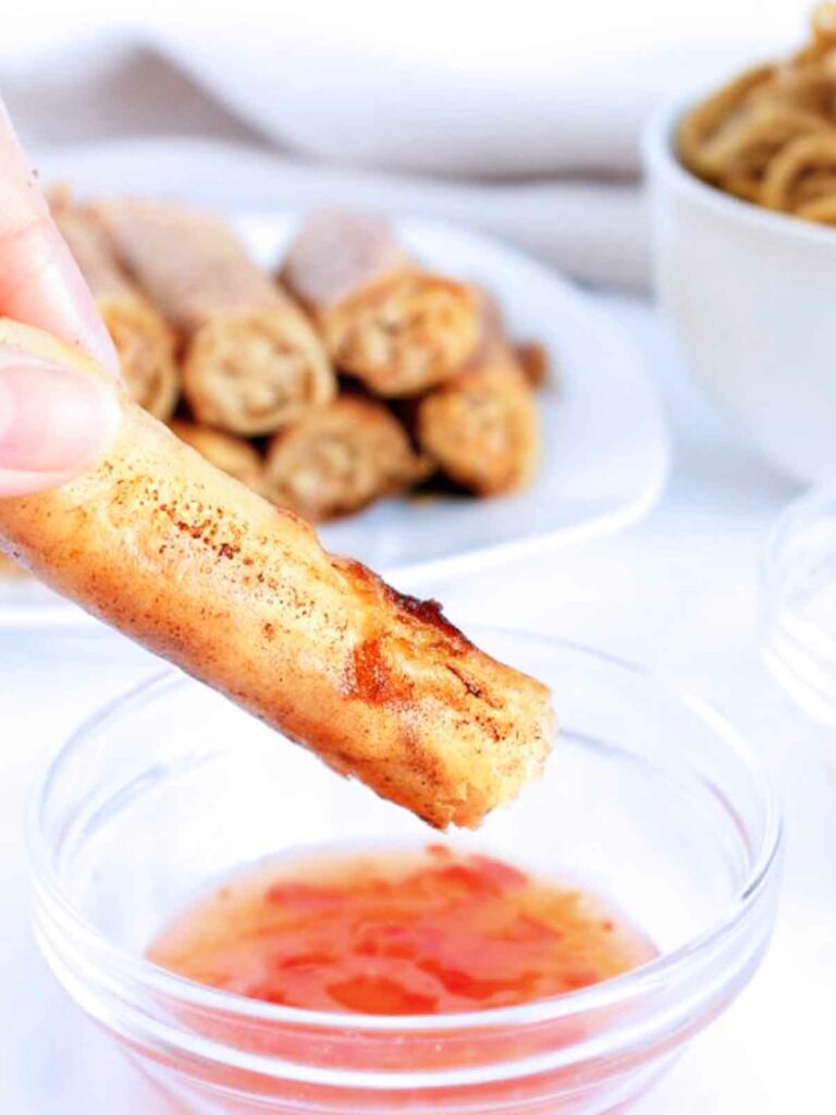 egg roll dipped in sauce