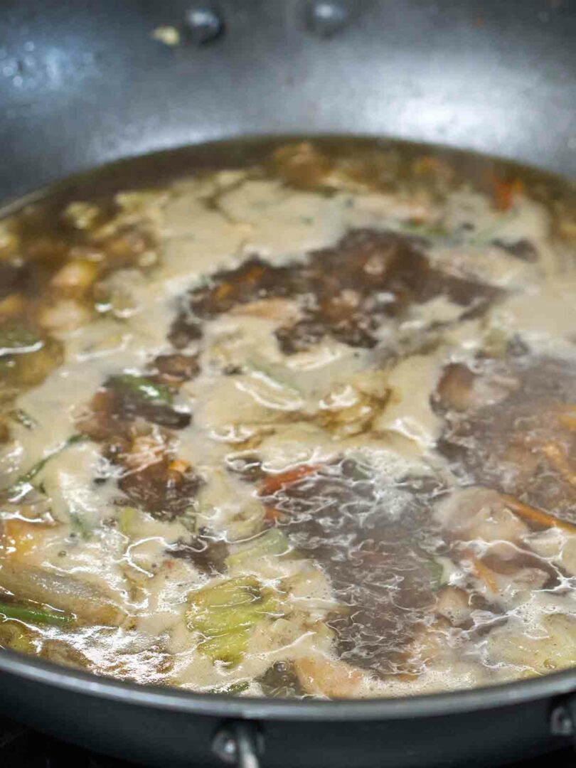 liquid simmering in a wok