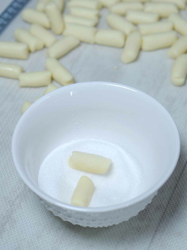 candies dredge in sugar in a bowl